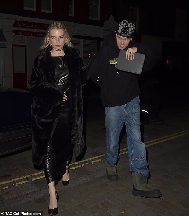 Lottie Moss, 26, looked chic as she arrived at London's Chiltern Fire Station on Wednesday evening with a mystery man