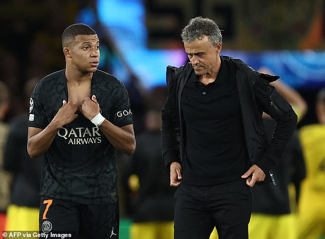 Kylian Mbappé and Luis Enrique (right) reportedly held calm talks after the PSG boss pulled the forward early in their last two matches.