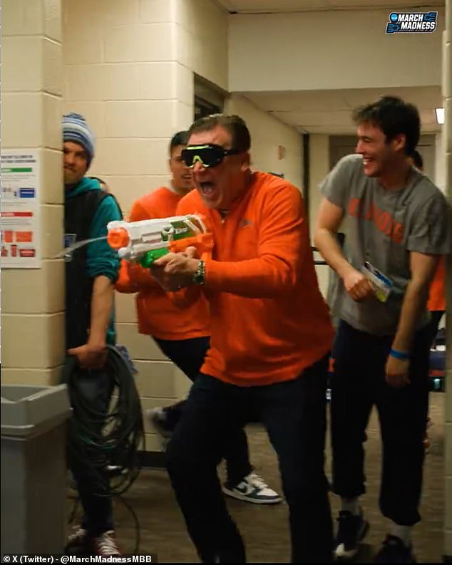 Illinois players and coaches celebrated with a water gun fight after their victory over Duquesne.
