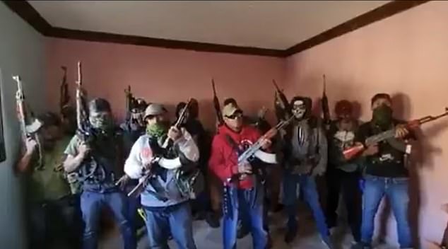 Armed members of La Familia Michoacana in a photograph shared on social networks
