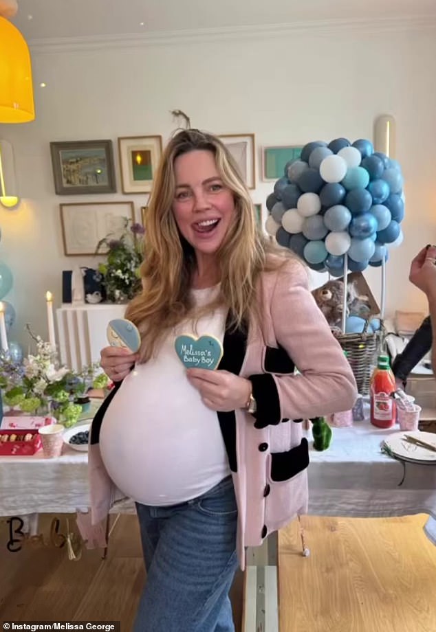 Melissa George (pictured) has shared a first look at her newborn son after giving birth to her third child aged 47.