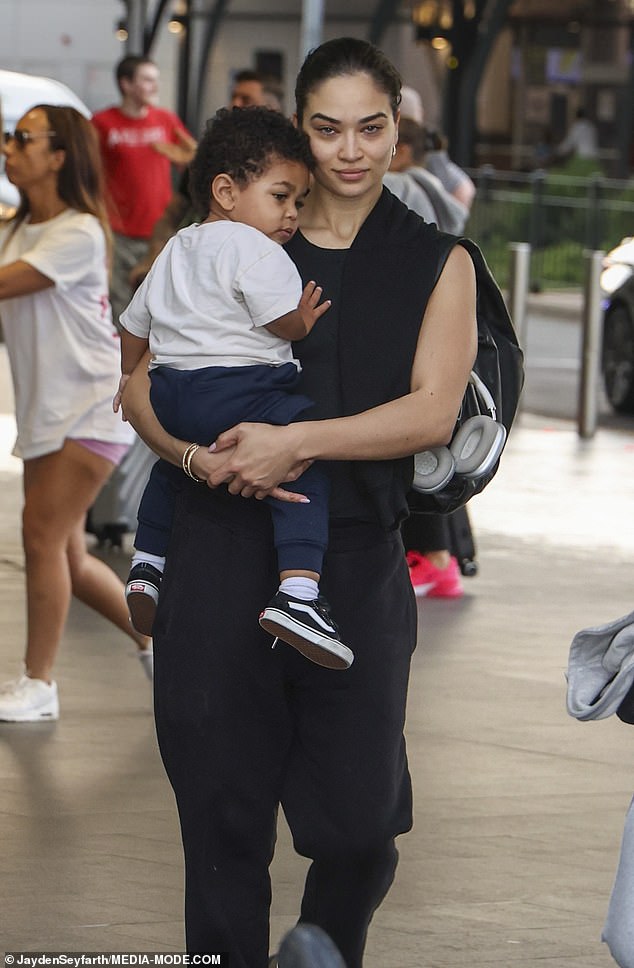 Shanina Shaik, 33 (pictured) was spotted arriving at Sydney Airport without makeup with her son Zai, one, on Wednesday.