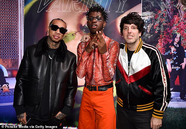 Ron Perry (right) pictured here with artists Tyga and Lil Nas