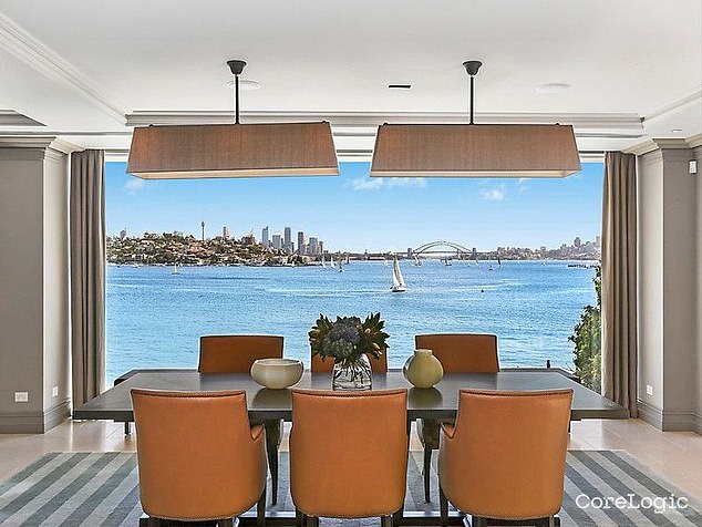 Lawyer Georgina Black and her husband, a property executive, live in the trophy house 'Indah' ​​which has spectacular interrupted views (above) of Sydney Harbour.