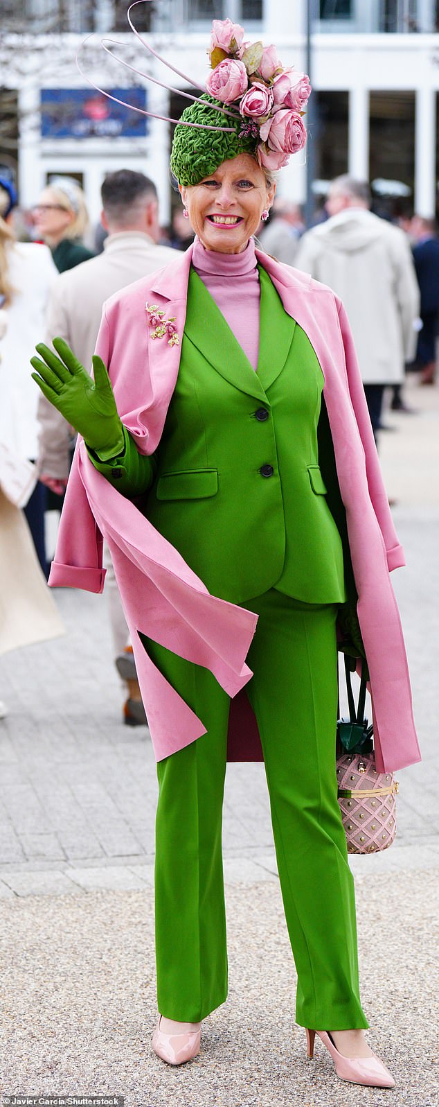 It's easy to be green!  One reveler stood out in signature style by teaming his green suit with a pink coat and accessories