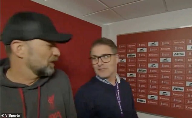 A new clip of Jurgen Klopp emerging from a TV interview on Scandinavian TV shows a terse exchange with a journalist as the camera continues to roll.