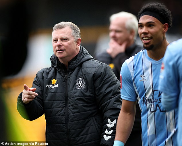 Coventry City manager Mark Robins apologized for his post-match celebrations following his side's dramatic FA Cup win