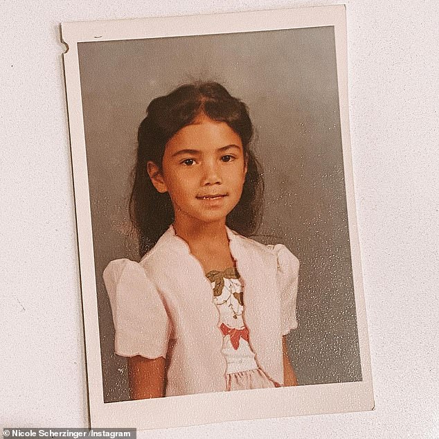 Former Pussycat Dolls singer's Hawaiian father Alfonso Valiente left Nicole and her mother Rosemary Elikolani when she was just three (Nicole pictured as a child)