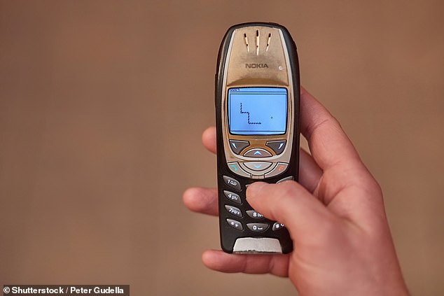 The Nokia ringtone is one of the catchiest sounds of the 90s. Pictured is an archive image of the classic game Snake II played on a Nokia 6310i.