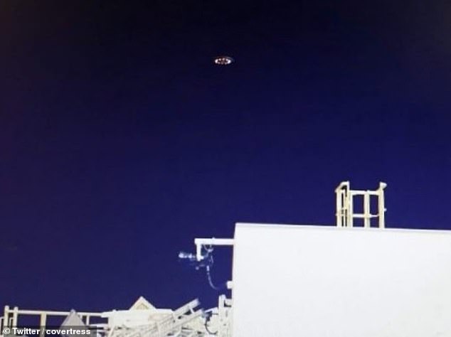 Two UFOs have been spotted flying over an oil rig off the coast of Mexico, where locals claim it is home to a secret underwater alien base.  A member of the ship's crew near Tampico took two images