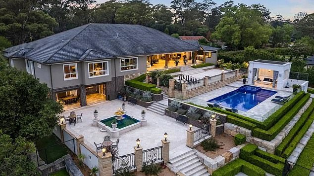 The six-bedroom house is set on a sprawling 2.11 hectare grounds and features a swimming pool, tennis court and manicured gardens with its own road.