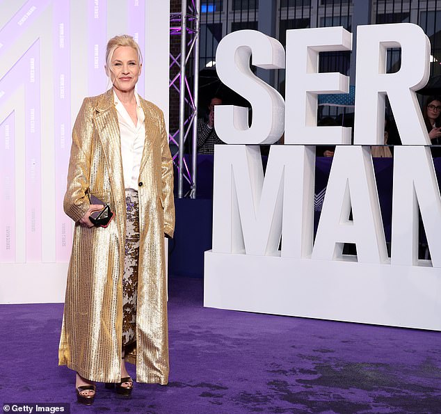 Dressed in a fabulous gold coat and matching metallic skirt, the Boyhood actress arrived as guest of honor and took over the red carpet