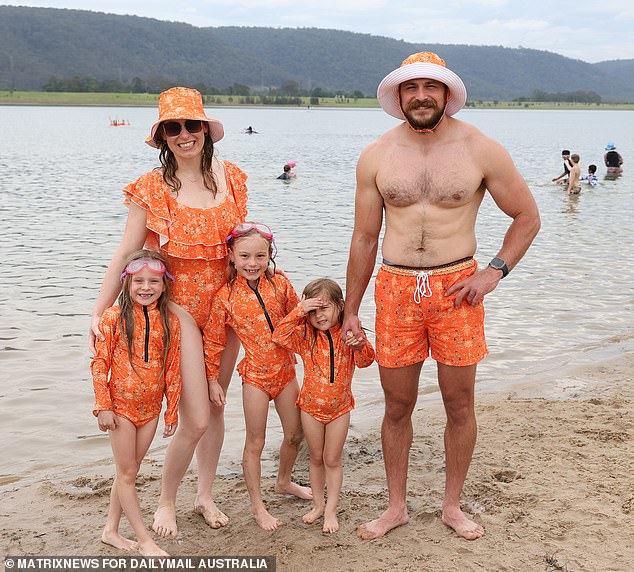 Penrith Beach has been granted a reprieve ahead of its planned closure this month, but the future of the popular western Sydney attraction remains unclear.  Tahnee and Steve are pictured with their children at the beach.