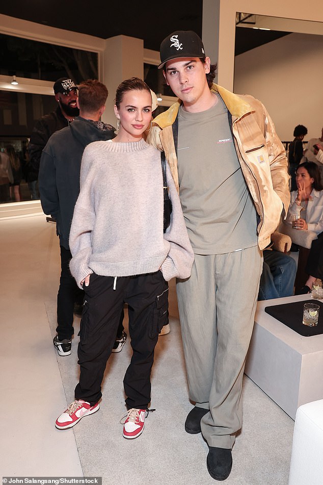 Paris Brosnan opted for a sporty outfit as she posed alongside her long-term girlfriend Alex Lee-Aillon at the Los Angeles launch of British streetwear brand Represent.