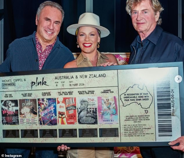 Pink shared that her tour Down Under had broken numerous records and shared a snap with her promoter Michael Coppel and manager Roger Davies as they celebrated her achievements.