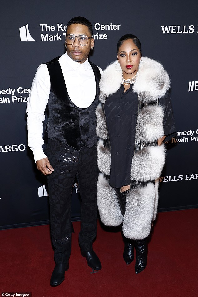 Ashanti and her boyfriend Nelly were a stylish couple at the 25th Annual Mark Twain Prize for American Humor Gala in Washington, DC on Sunday.  The 43-year-old singer-songwriter, who is rumored to be pregnant with her first child with Nelly, 49, wore a chic black and white ensemble.