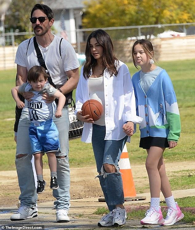 Jenna Dewan showed off her baby bump in a white t-shirt while visiting a park with her family in Los Angeles on Saturday afternoon