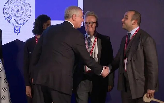 Prince Andrew, pictured shaking hands with London-based Turkish businessman and former banker Selman Turk, who is accused of defrauding one of his clients and arranging payments of £1.4 million to the duke and his family.