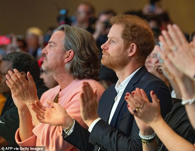 Prince Harry sat next to Meghan Markle's longtime friend and confidant Markus Anderson while supporting his wife at SXSW on Friday.