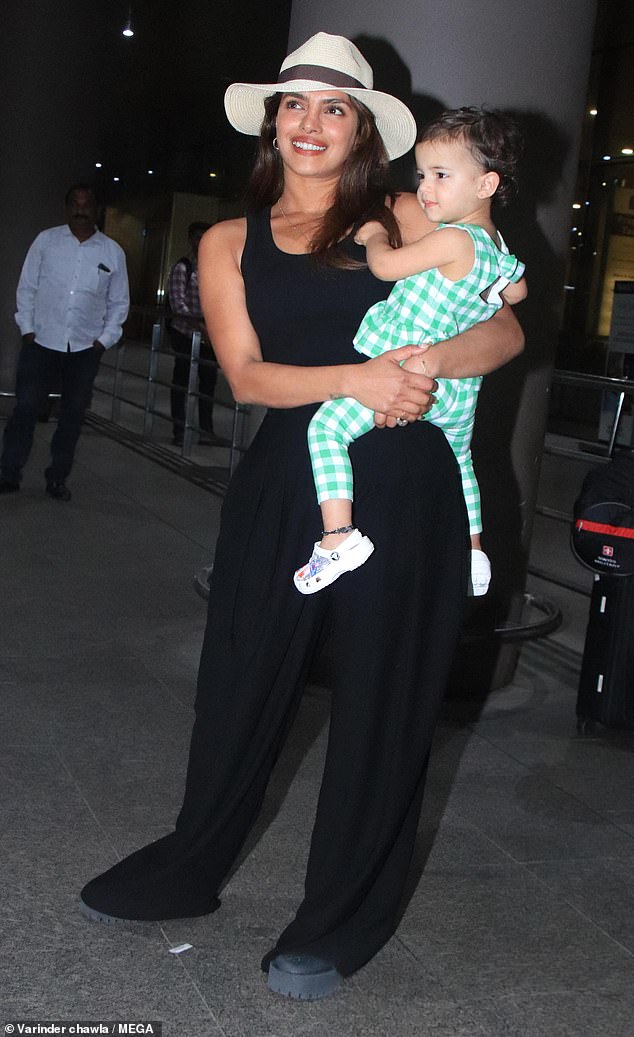 Priyanka Chopra doted on her two-year-old daughter Malti as she arrived at the Mumbai airport on Thursday.