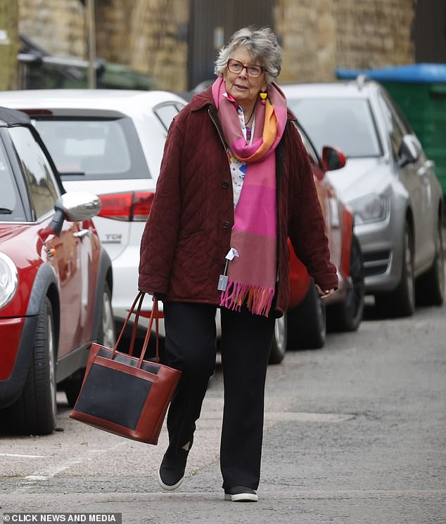 Prue Leith showed off her quirky style in a pink scarf as she was spotted out for the first time since announcing she is taking a break from The Great British Bake Off in Chipping Norton on Wednesday