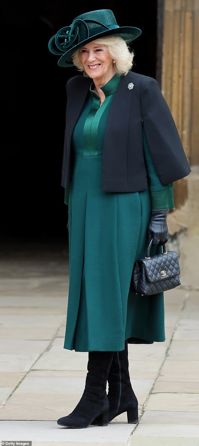 A queen dressed in green! Camilla looked chic in a bright green dress with a matching hat, paired with tall black suede boots and a black clutch.