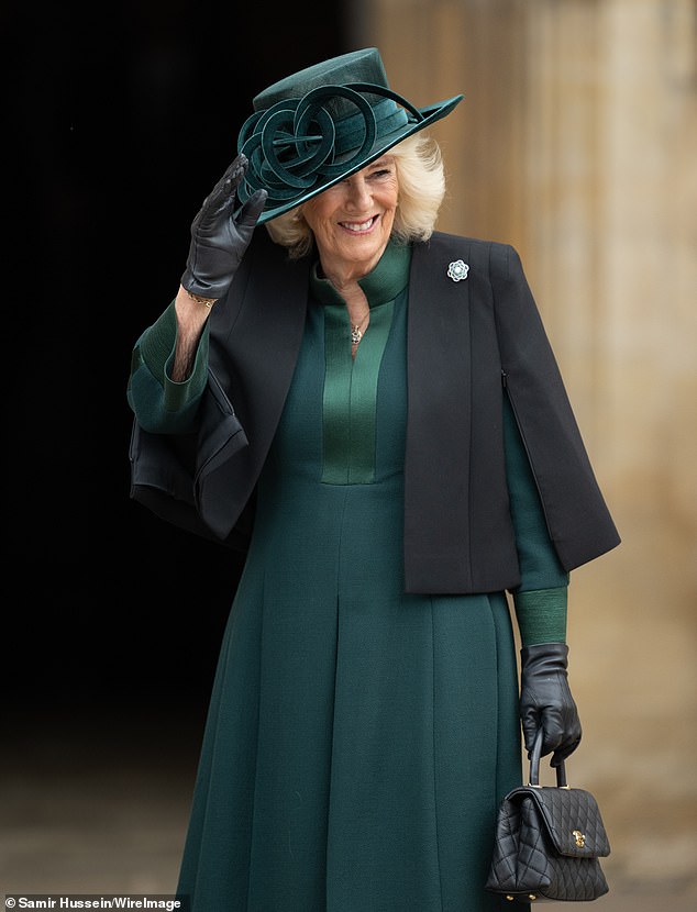 The Queen wore a green Anna Valentine dress and a Philip Treacey hat with an emerald and diamond brooch belonging to Queen Elizabeth.