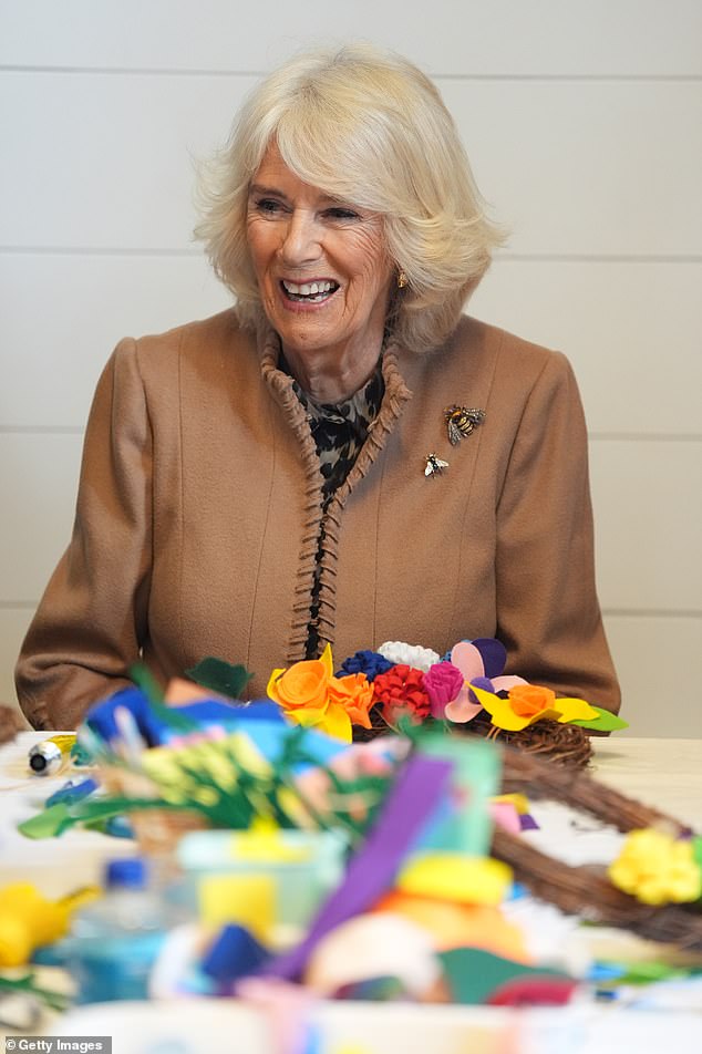 Queen Camilla appeared very animated during the workshop.