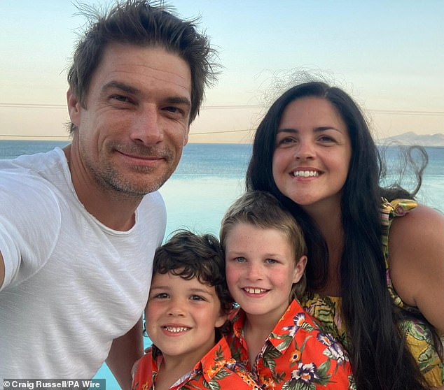 Actor Craig Russell, pictured with his family, had surgery for a brain tumor last year