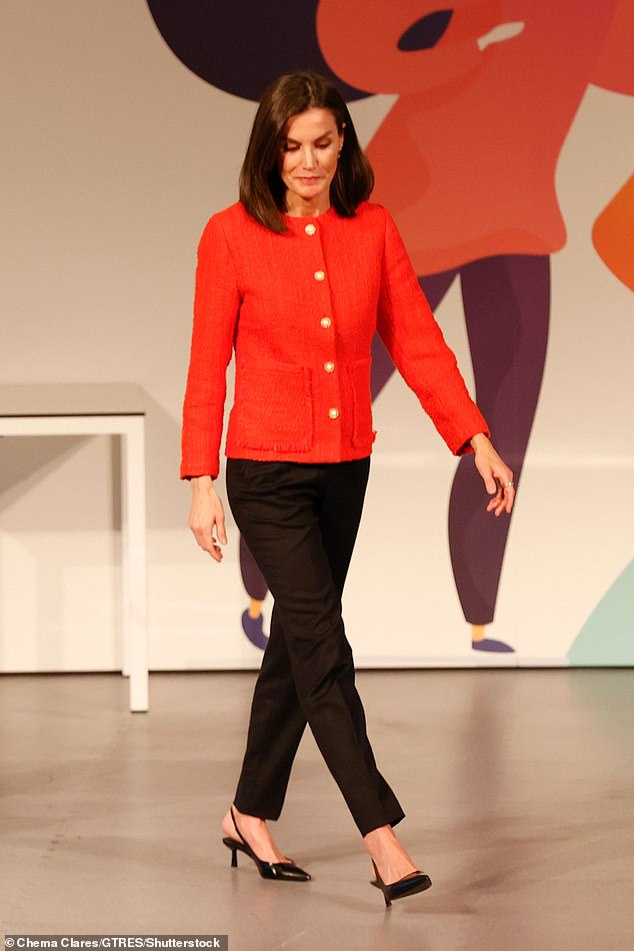 Royal in red!  The Queen of Spain stunned as she arrived on stage at the Fundación Mutua Madrileña event in Madrid