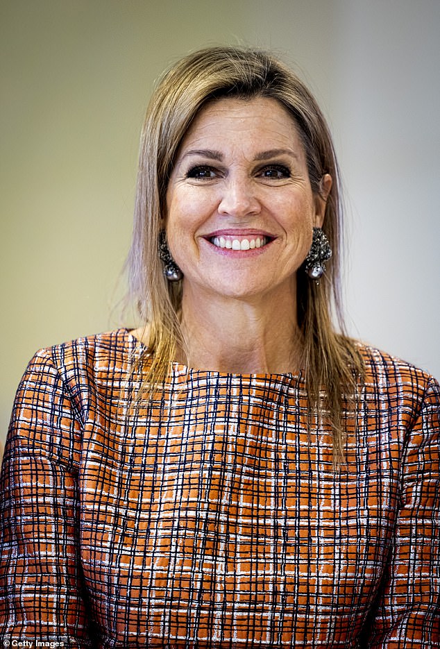Queen Maxima appeared in good spirits as she watched a performance of KiKiD's Talk to Me at Tobias School in Amsterdam.