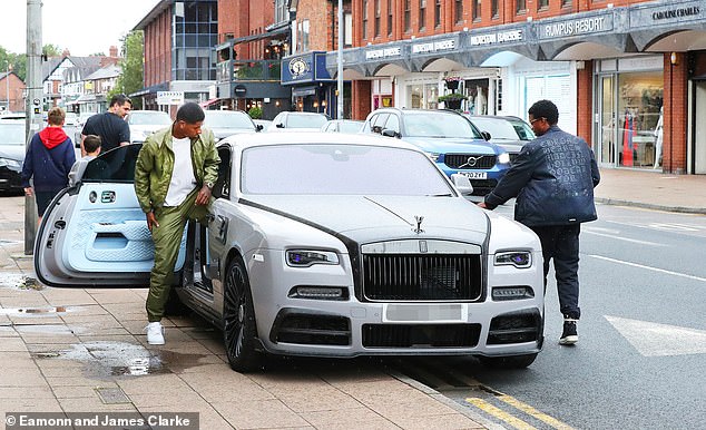 A YouTuber has revealed the serious damage suffered by Marcus Rashford's Rolls Royce (left)