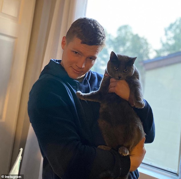 Garrison was seen posing with one of his pets in a January 2022 post on Instagram with his feline Catthew.