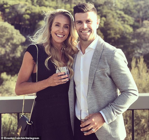 Cotchin (pictured with wife Brooke) invited Martin to live in his family home when he was dealing with off-field drama.