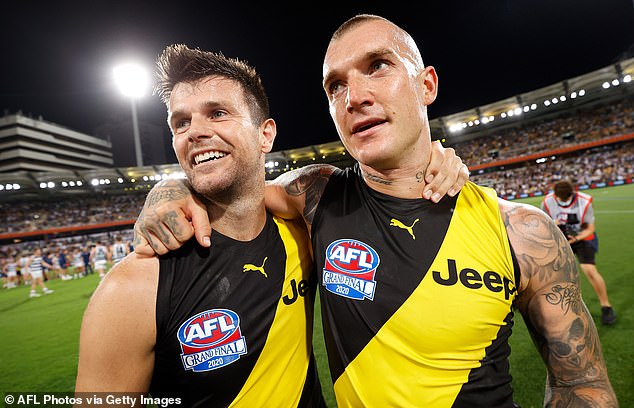 AFL legend Trent Cotchin (pictured left) has revealed Dustin Martin's bizarre act that left him nervous when they were living together as up-and-coming footballers in Richmond.