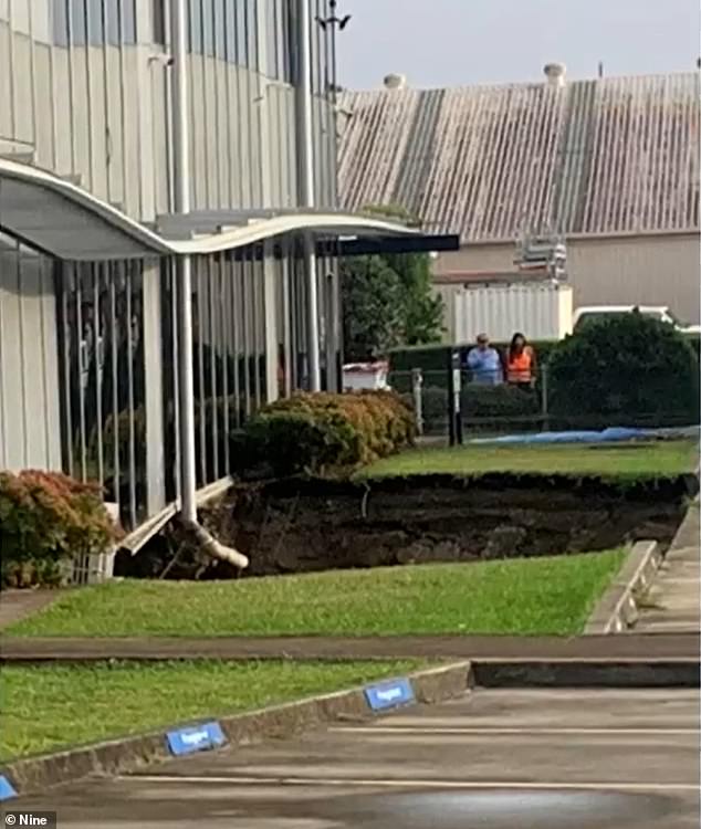 The sinkhole is believed to have opened overnight or early this morning near an industrial complex in Sydney's south.
