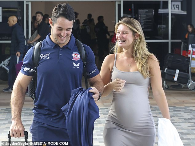 Nat Butcher was greeted at the airport by his pregnant wife, Harmony.