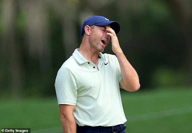 Rory McIlroy of Northern Ireland reacts to a missed putt on the first hole on Sunday