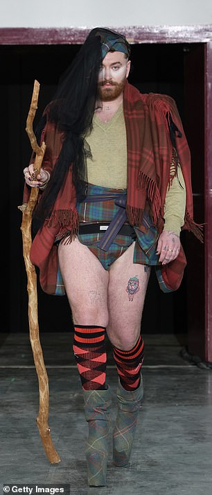 Sam Smith put on a VERY leggy display in a bizarre tartan ensemble for the Vivienne Westwood show at Paris Fashion Week on Saturday.