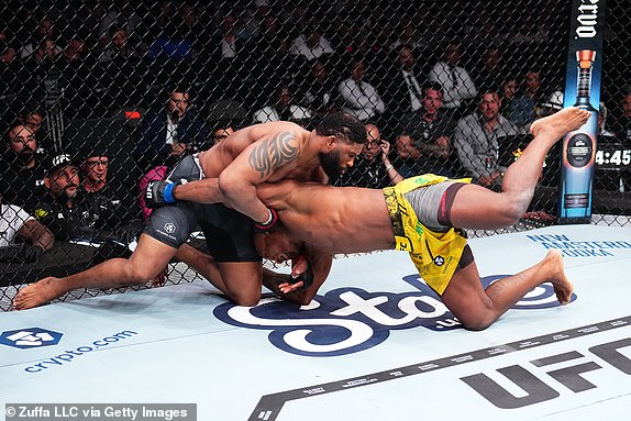 MIAMI, FLORIDA – MARCH 9: (RL) Jailton Almeida of Brazil attempts to defeat Curtis Blaydes in a heavyweight bout during the UFC 299 event at Kaseya Center on March 9, 2024 in Miami, Florida. (Photo by Chris Unger/Zuffa LLC via Getty Images)