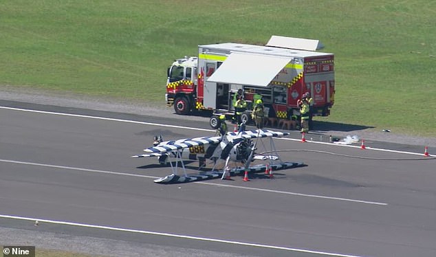 A vintage biplane landed upside down at Shellharbour Airport on Saturday.