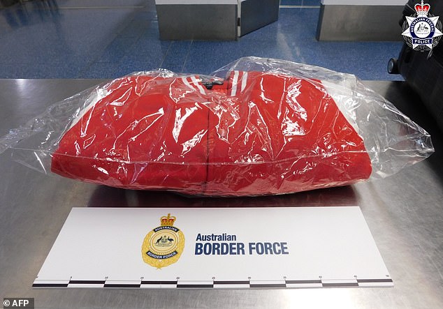 Officers searched the woman's purse and opened the lining of several jackets (pictured), where they found small packages hidden inside the seams.