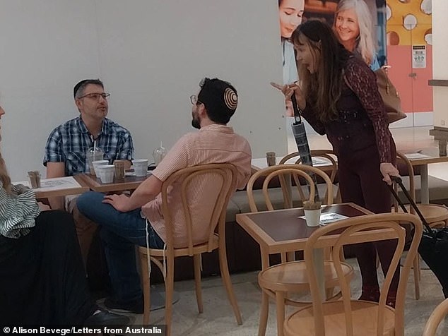 A group of Jewish customers at a cafe in Sydney's east were accosted by an angry stranger who accused them of genocide over Israeli actions in Gaza.