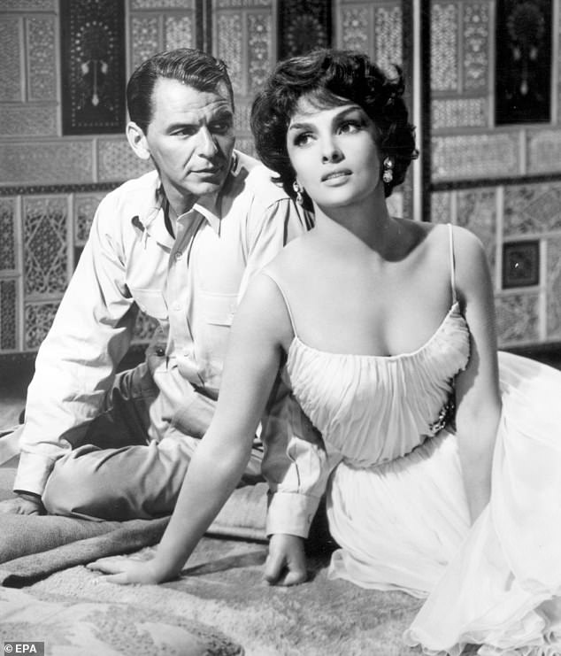 He was a friend of Frank Sinatra, who is seen here with actress Gina Lollobrigida in a scene from the film Never So Few (1959).