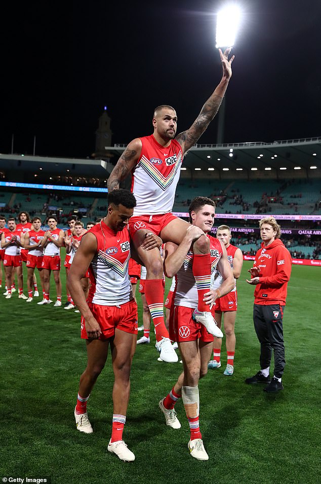 Franklin is chaired off the field by his Sydney Swans teammates after playing his 350th AFL match