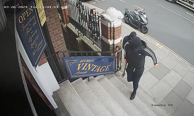 A CCTV monitor saw two men wearing balaclavas approaching the Chelsea store.