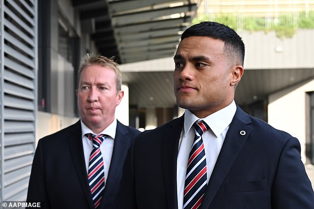 Leniu is pictured arriving at the court hearing with Roosters coach Trent Robinson.  Soon after, he was hit with the biggest suspension handed down by the NRL in six years