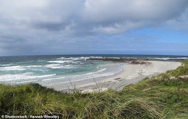 The island of Tiree (pictured) is second in the ranking, with 106 mm of average monthly rainfall.