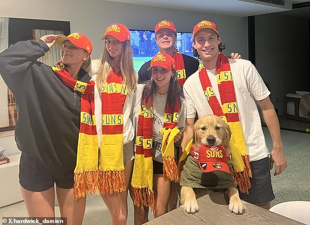 Hardwick posted this image that includes her kids and golden retriever Hank, all wearing Gold Coast Suns merchandise.