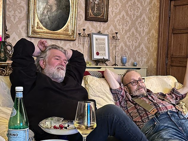 In the photos, the Hairy Bikers are seen relaxing on a couch while watching television.